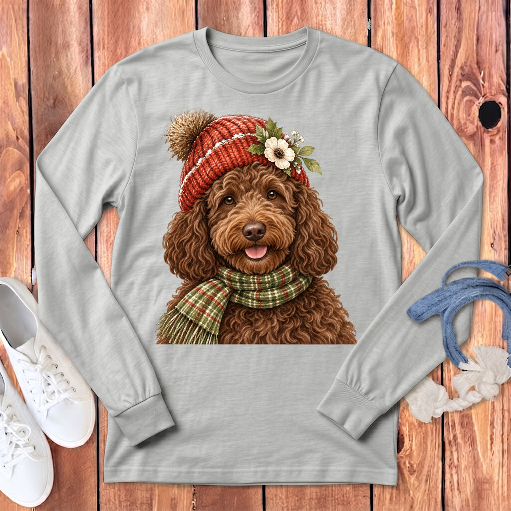 Light grey long-sleeve shirt with a watercolor doodle wearing a red hat and scarf.