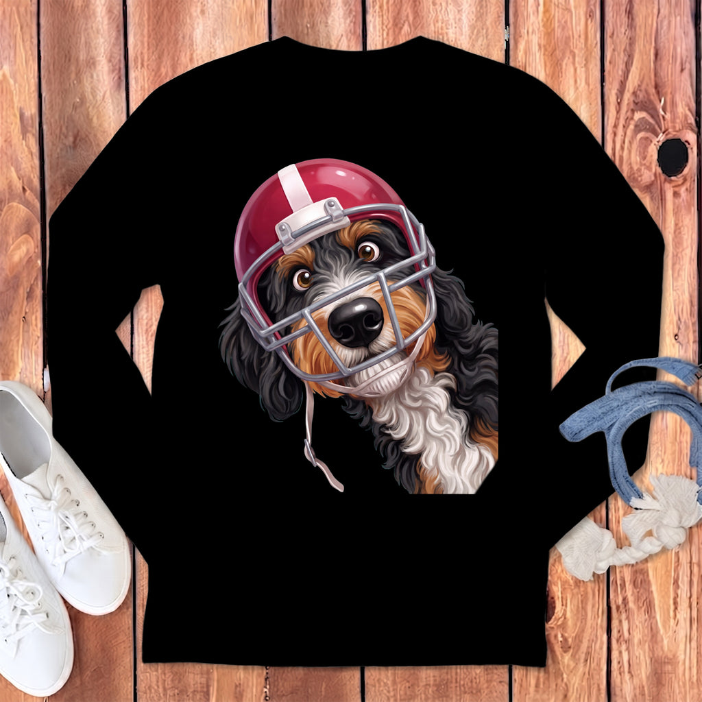 Black t-shirt with a Bernese Mountain Dog wearing a red football helmet.