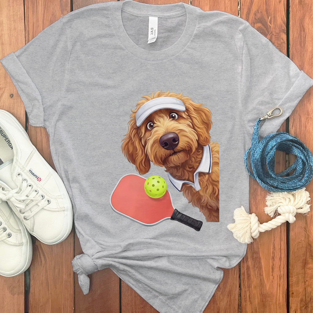 Apricot Goldendoodle Pickleball Player T-Shirt in Athletic Heather / S by Puppy Jo
