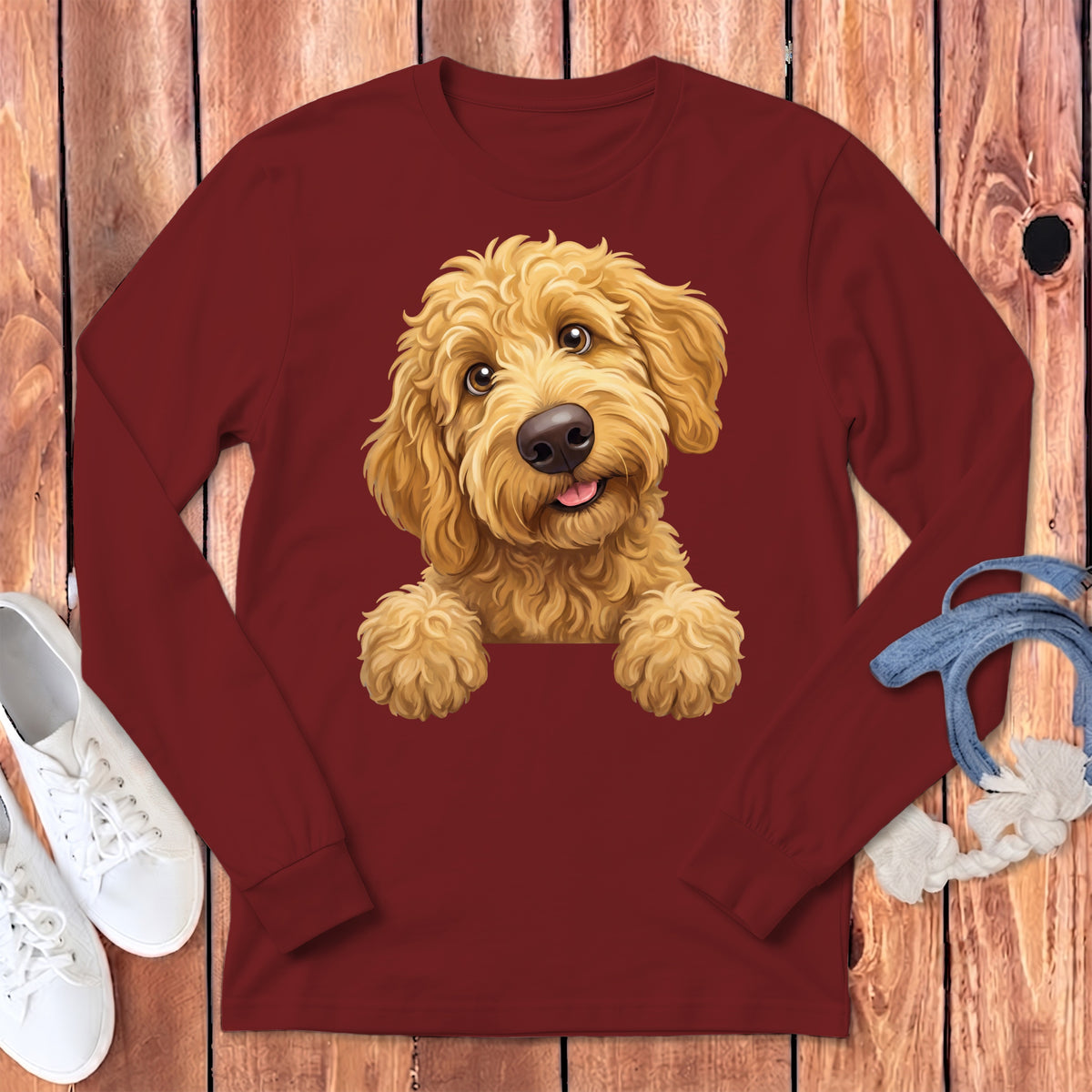 Maroon long-sleeve shirt with a cartoon goldendoodle dog graphic.