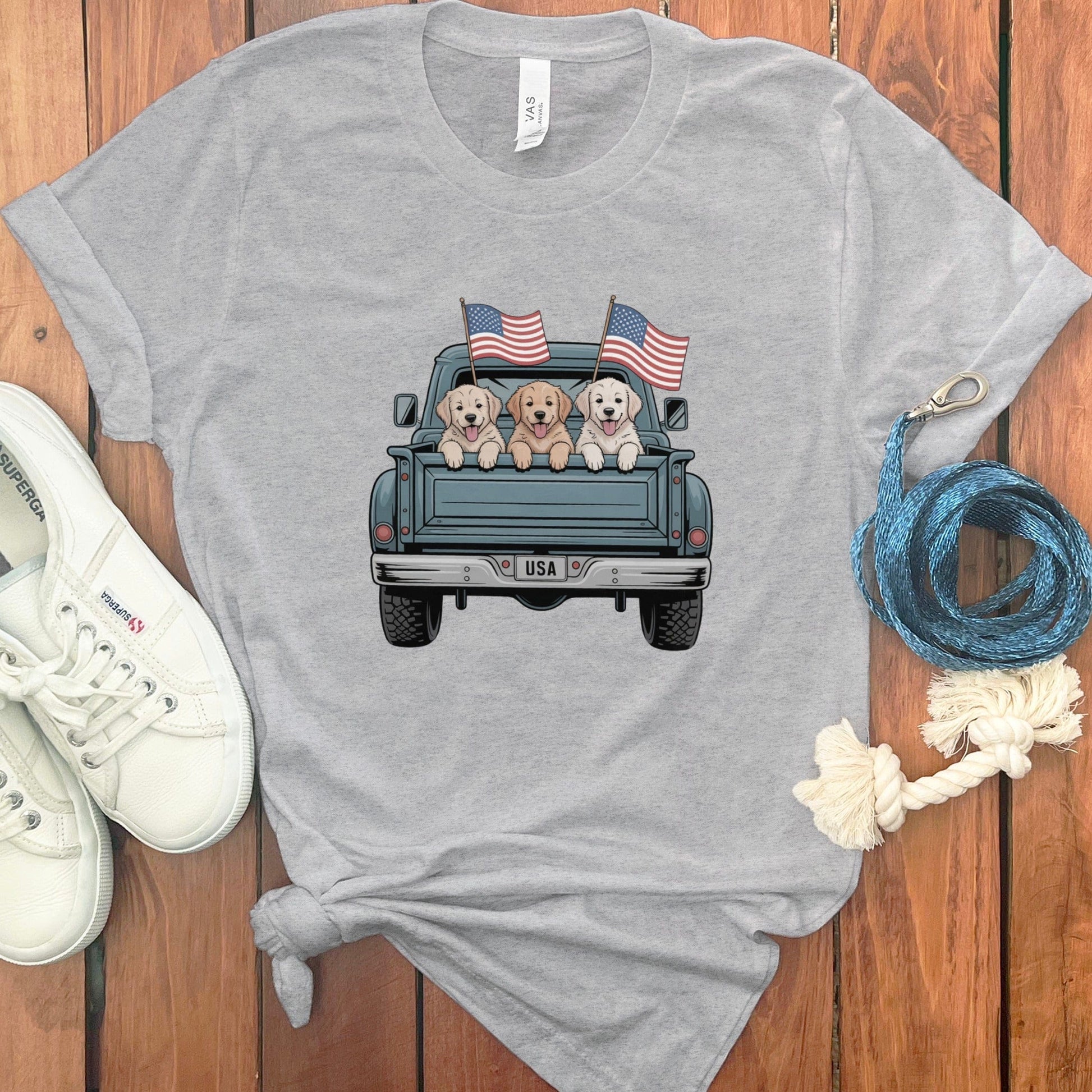 Adorable Puppies and Flags on Truck Graphic T-Shirt product type