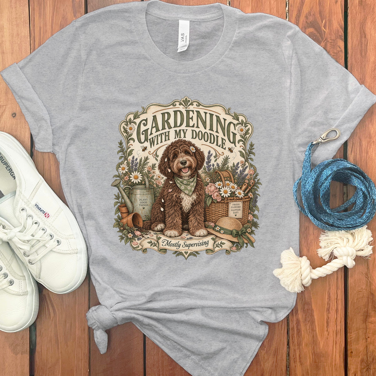 Grey t-shirt with "Gardening With My Doodle" text and a dog illustration.