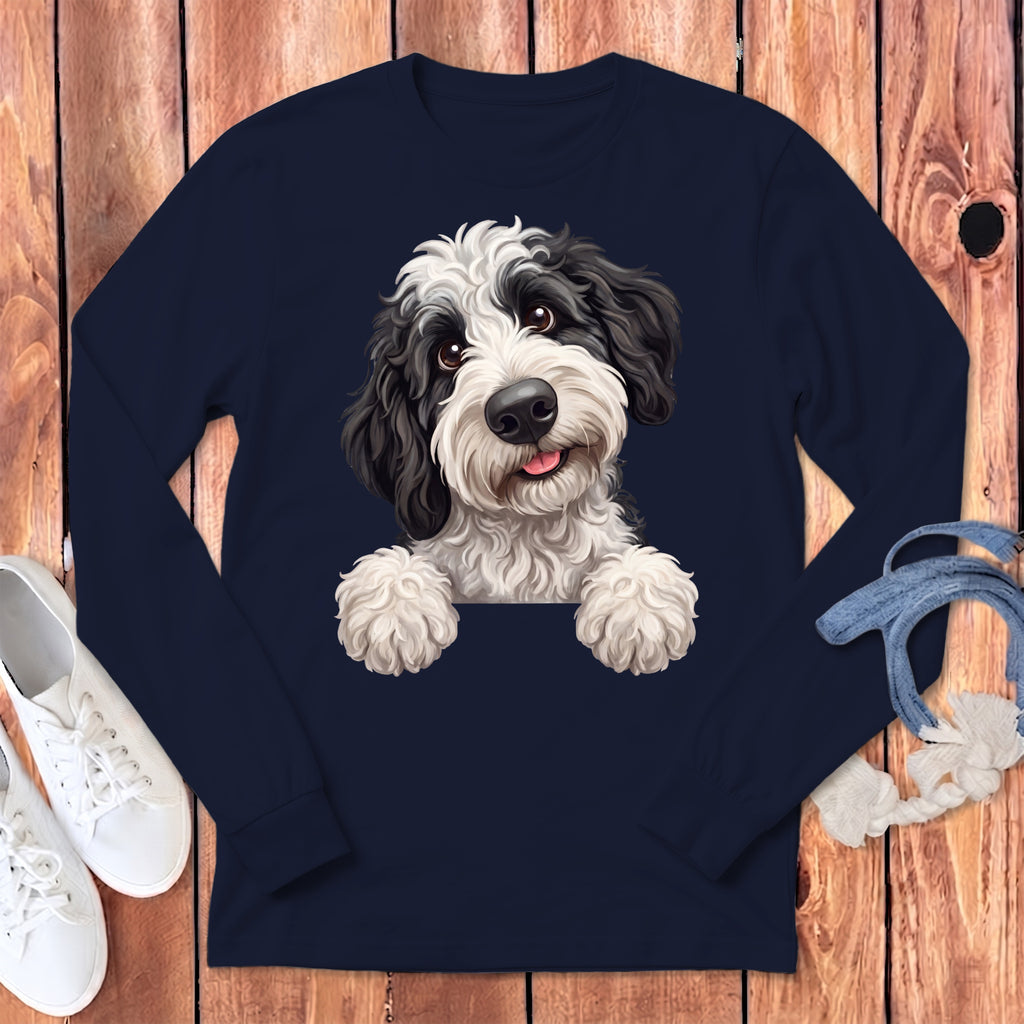 Navy long-sleeve shirt with a black and white fluffy dog illustration.