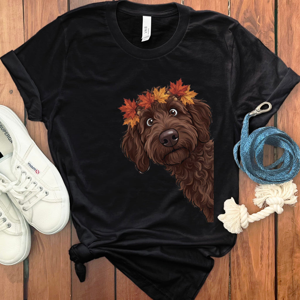 Black t-shirt with a brown doodle dog wearing a fall leaf crown.