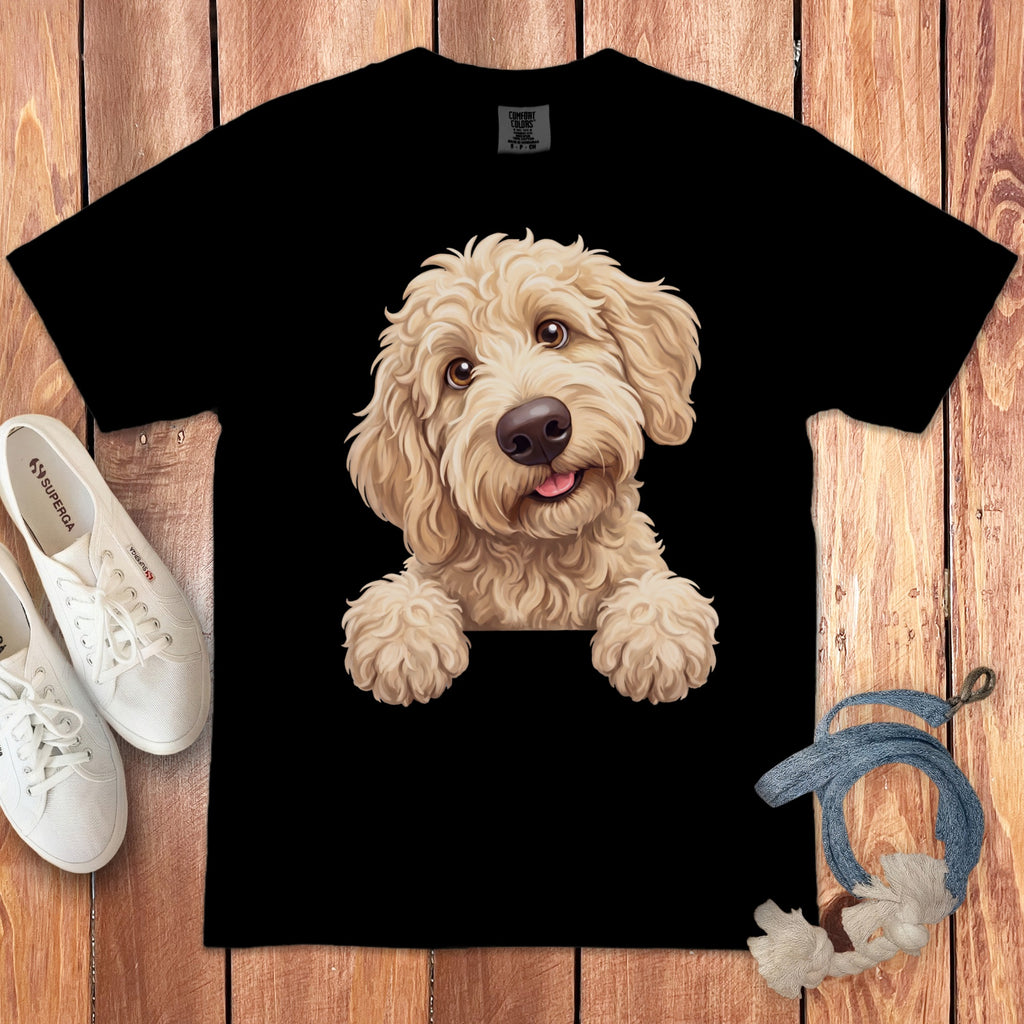 Black t-shirt with a fluffy light brown dog illustration peeking over the collar.