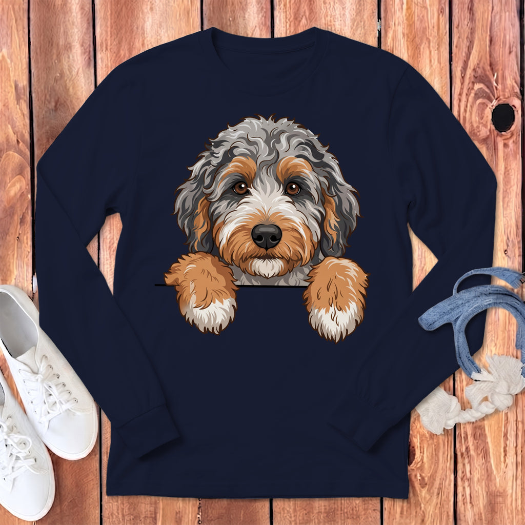 Navy long-sleeve shirt with a cartoon dog peeking over the collar.