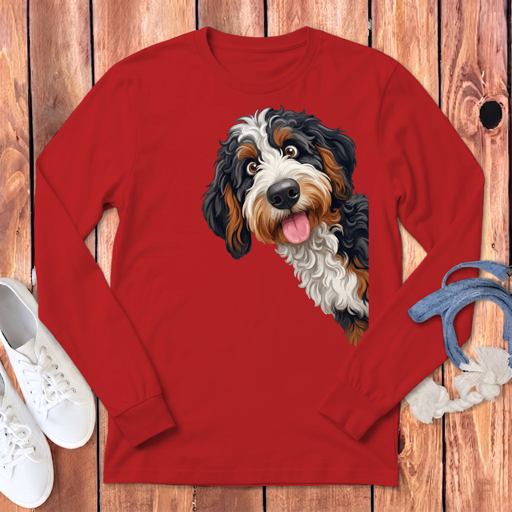 Bernese Mountain Dog graphic on a red long-sleeved shirt with white sneakers.