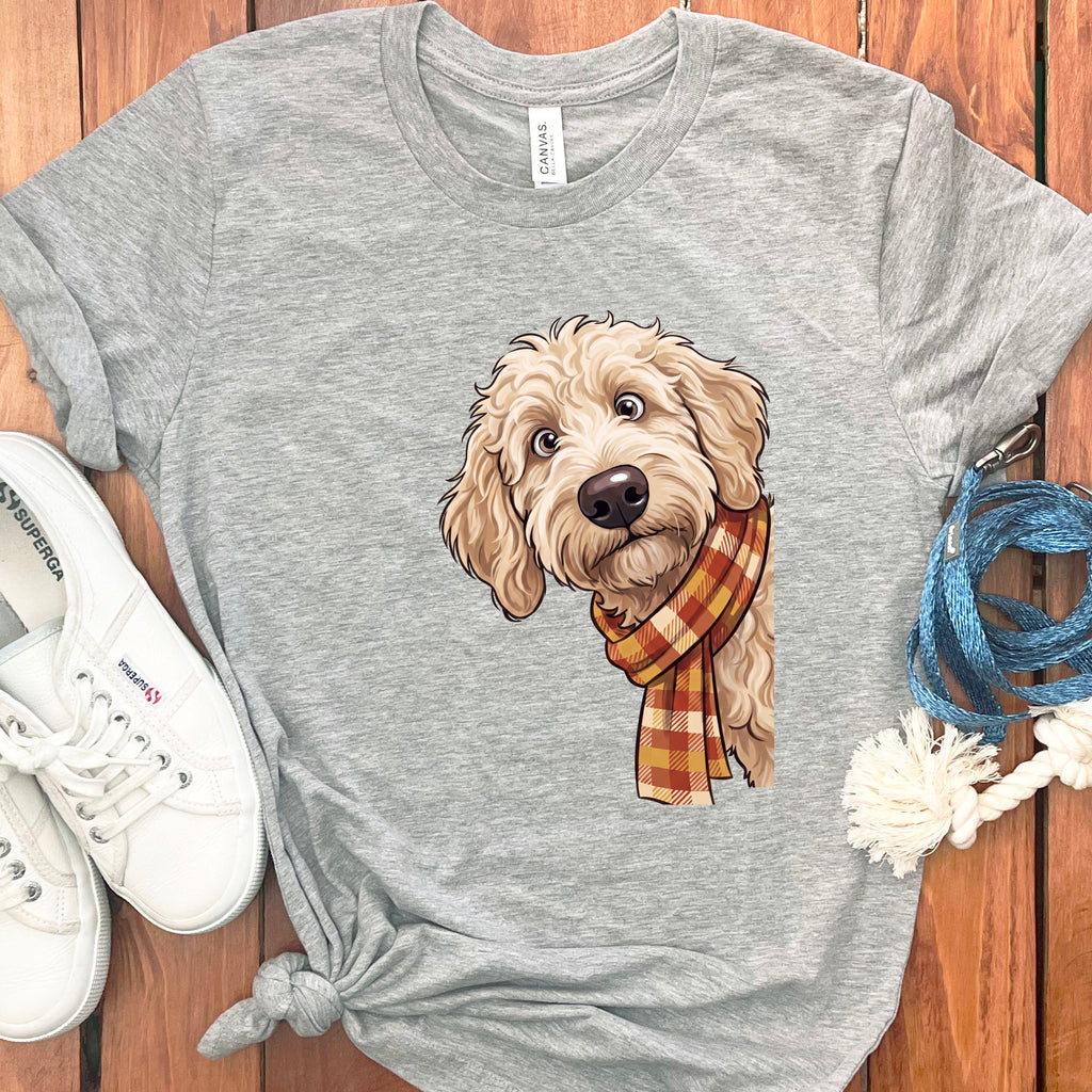 Light grey t-shirt with a printed doodle dog wearing a plaid scarf.