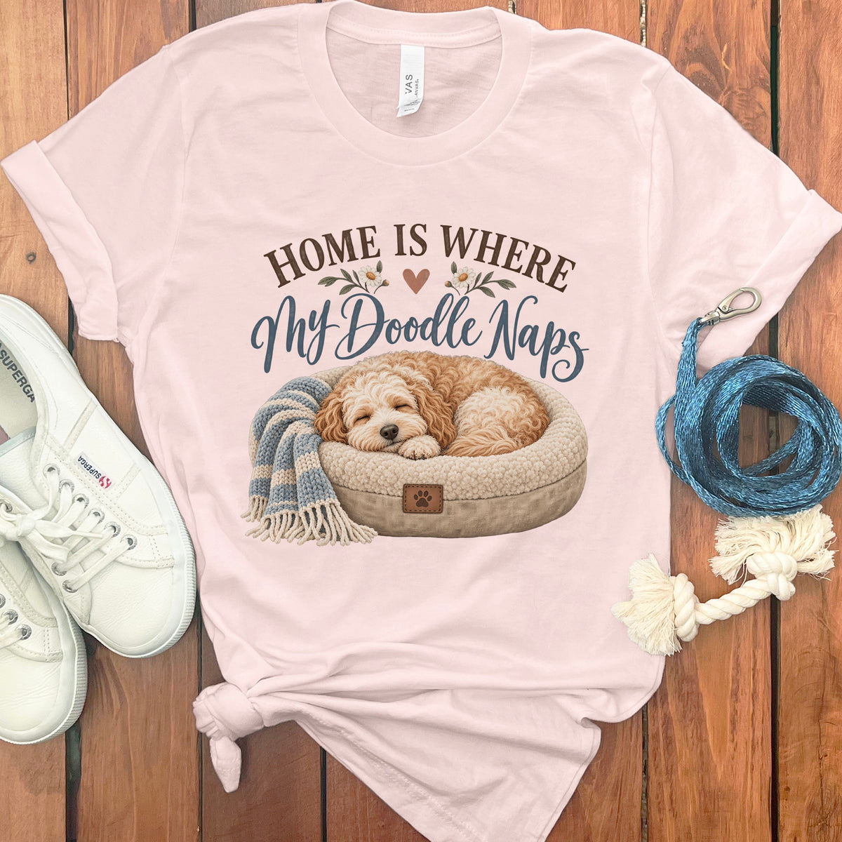 Pink t-shirt with "Home is Where My Doodle Naps" and sleeping doodle dog graphic.