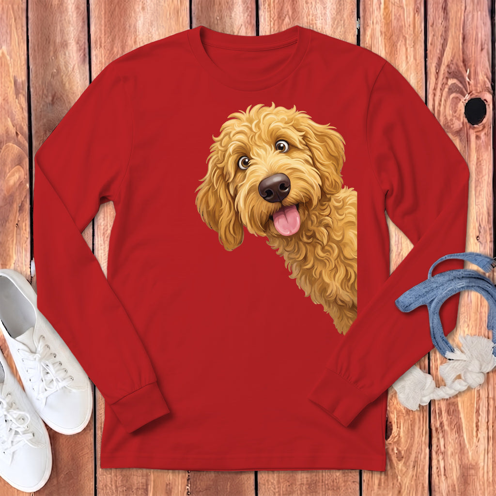 Red long-sleeve t-shirt featuring a graphic of a smiling, fluffy golden doodle dog against a wooden background.