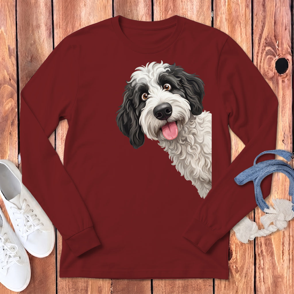 Maroon long-sleeve shirt featuring a black and white doodle dog peeking from the side.