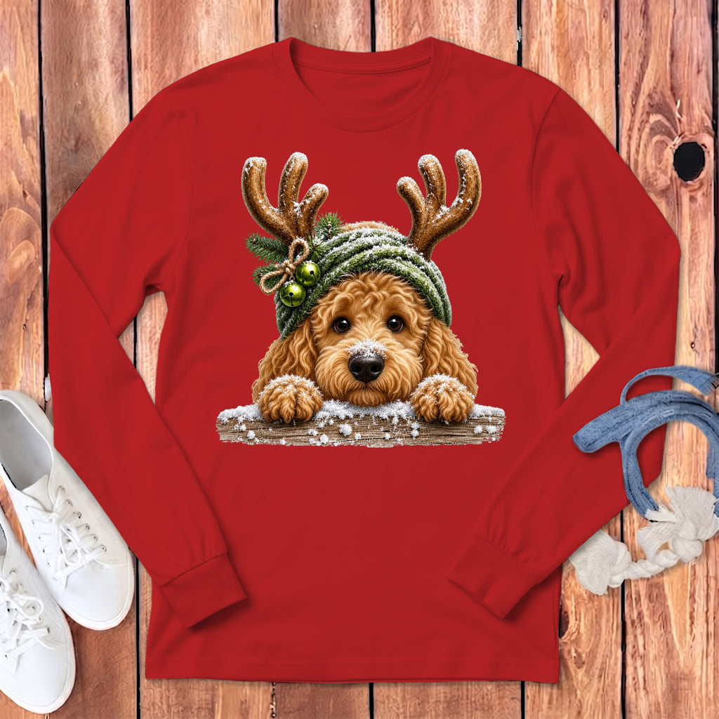 Red long sleeve shirt with a cute doodle dog wearing reindeer antlers and a winter hat.