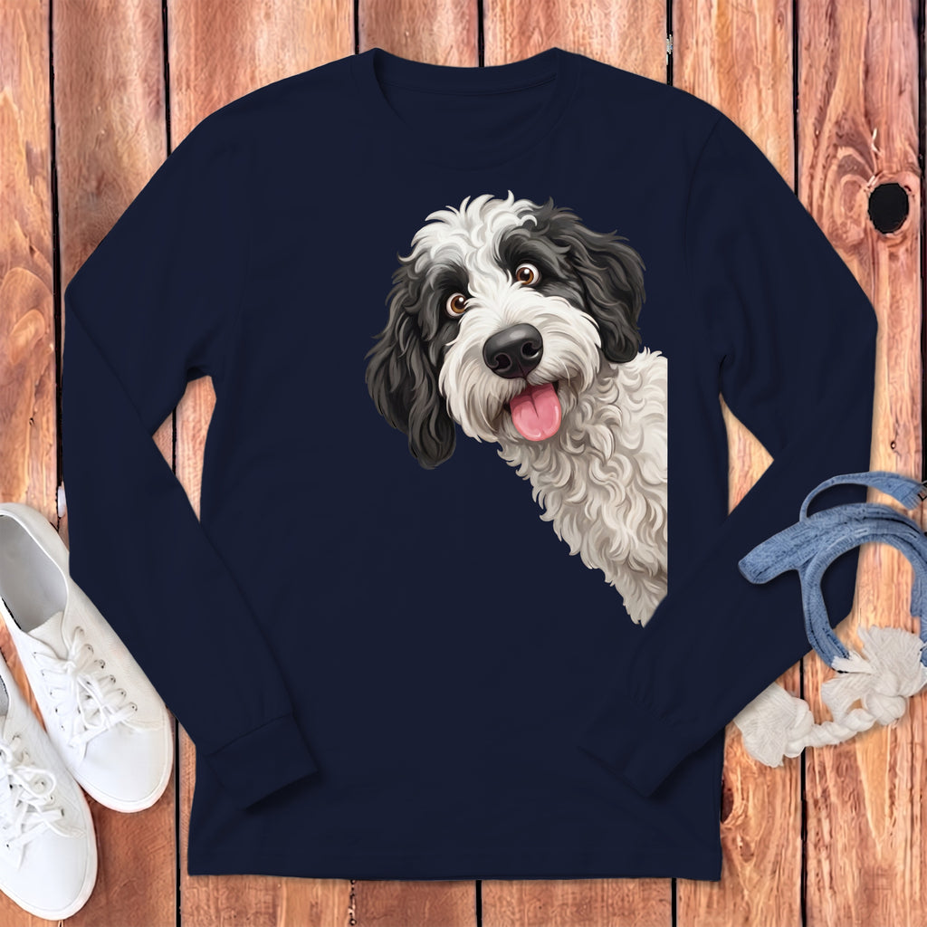 Long sleeve navy shirt with a black and white doodle dog graphic peeking from the side.