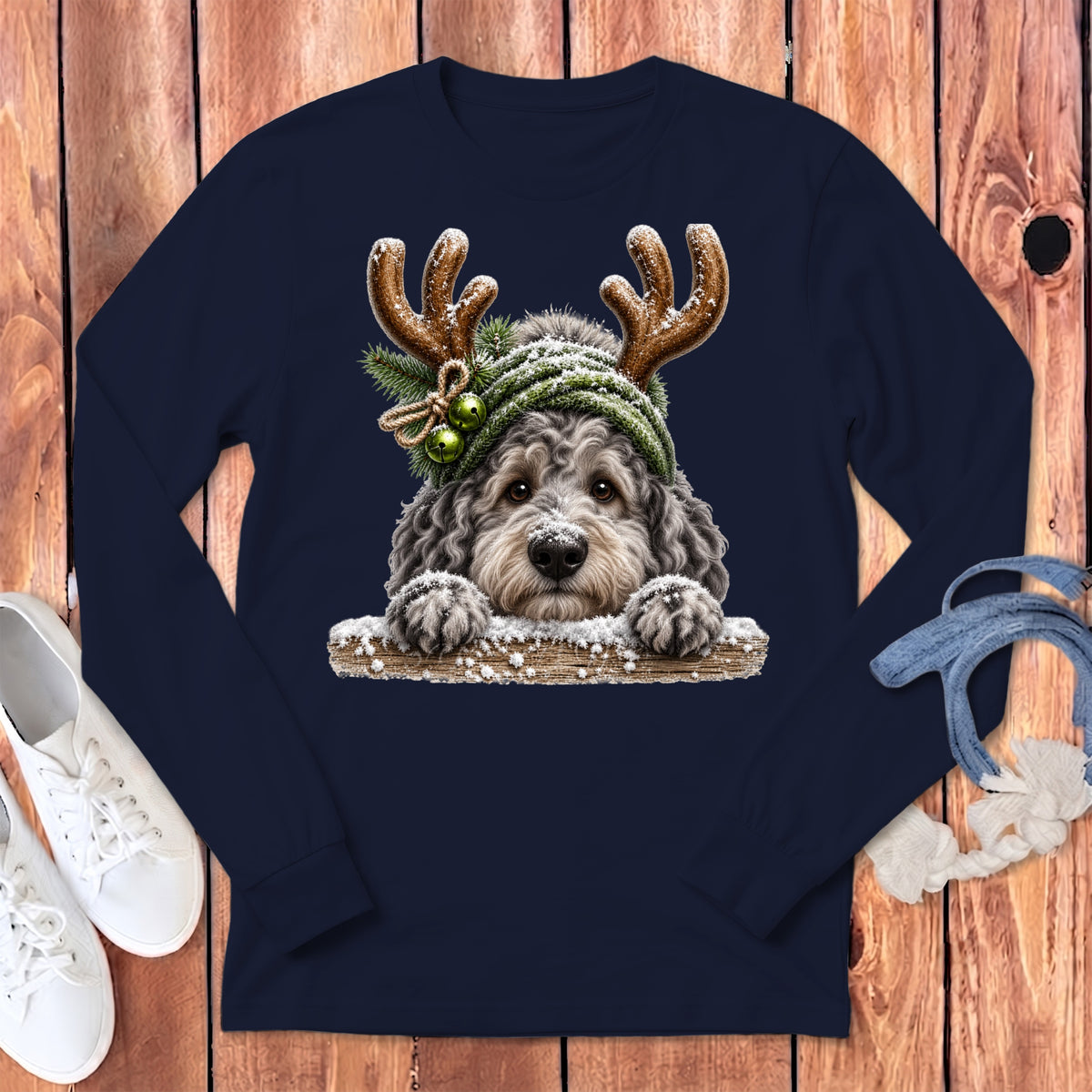 Dark navy long-sleeve shirt with a dog wearing antlers and a winter hat.