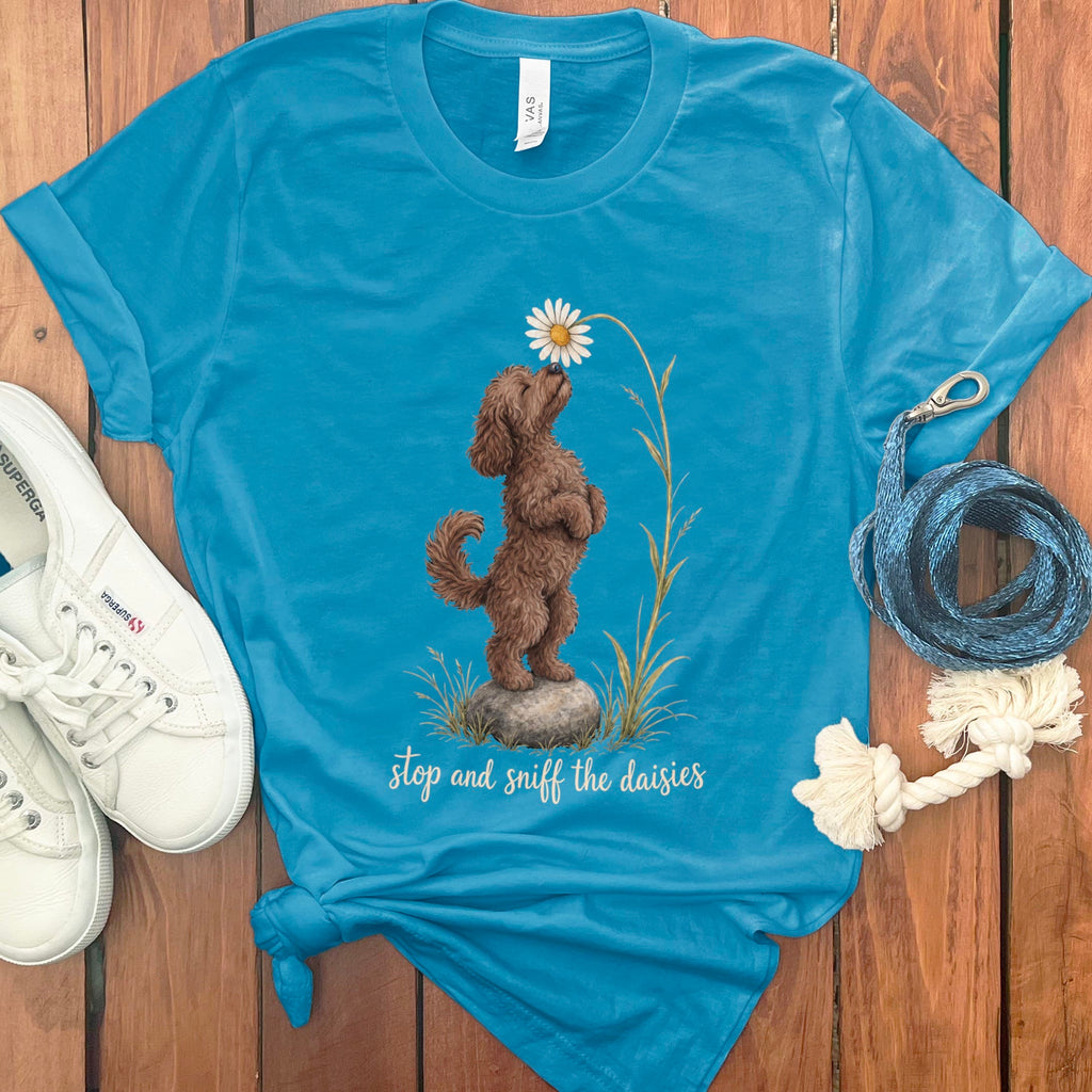 Chocolate Goldendoodle Sniff Daisies T-Shirt in S / Aqua by Puppy Jo