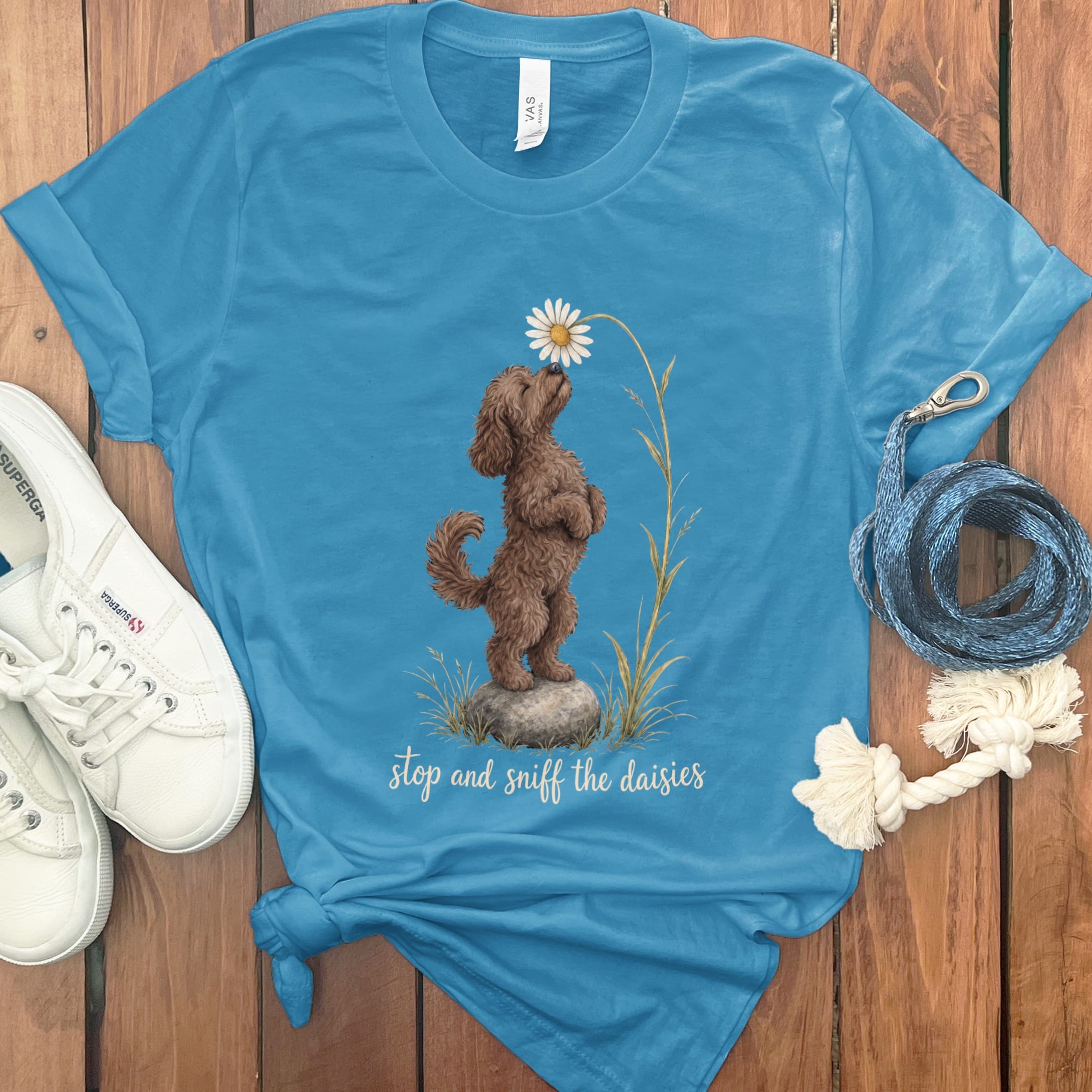 Chocolate Goldendoodle Sniff Daisies T-Shirt in S / Aqua by Puppy Jo