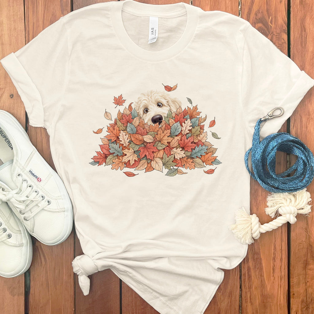 Cream Goldendoodle Peeking Leaf Pile T-Shirt in Natural / S by Puppy Jo