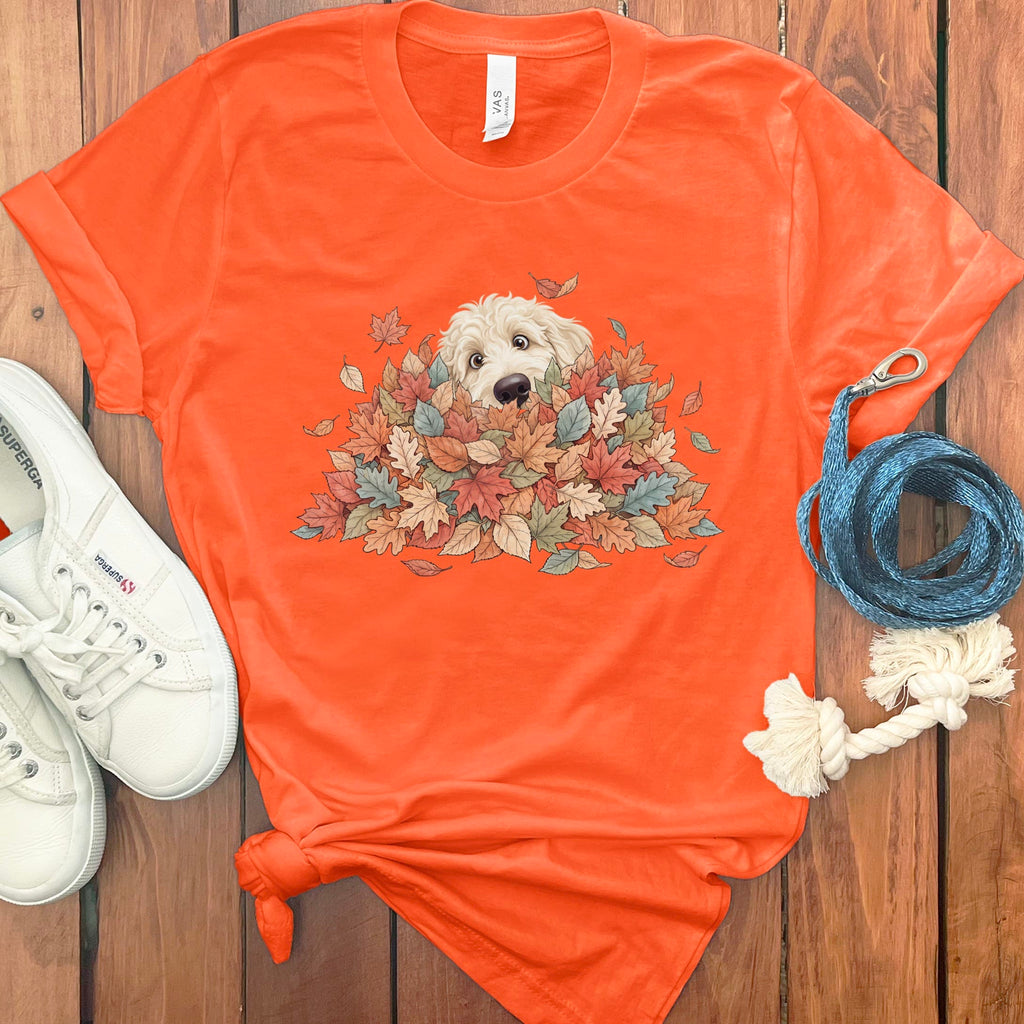 Cream Goldendoodle Peeking Leaf Pile T-Shirt in Orange / S by Puppy Jo