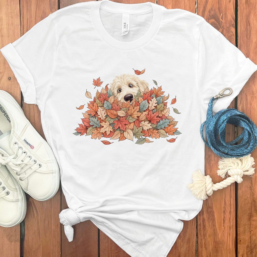 Cream Goldendoodle Peeking Leaf Pile T-Shirt in White / S by Puppy Jo
