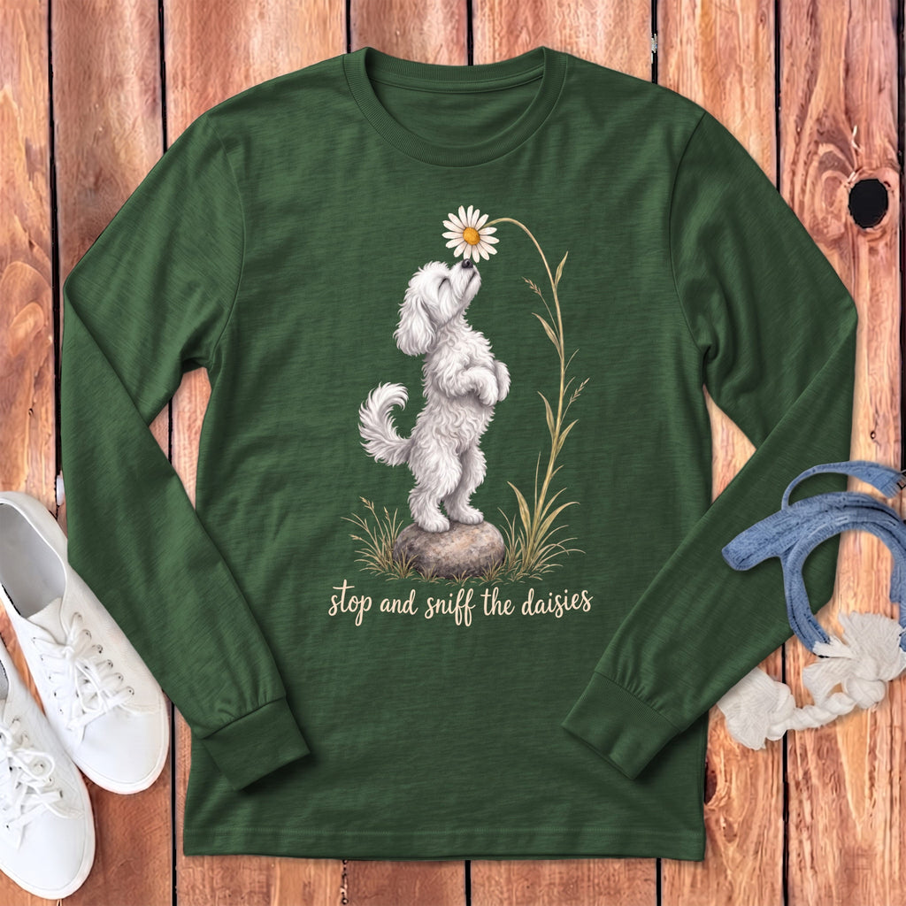 Long sleeve shirt with white dog sniffing daisy, "stop and sniff the daisies" text.