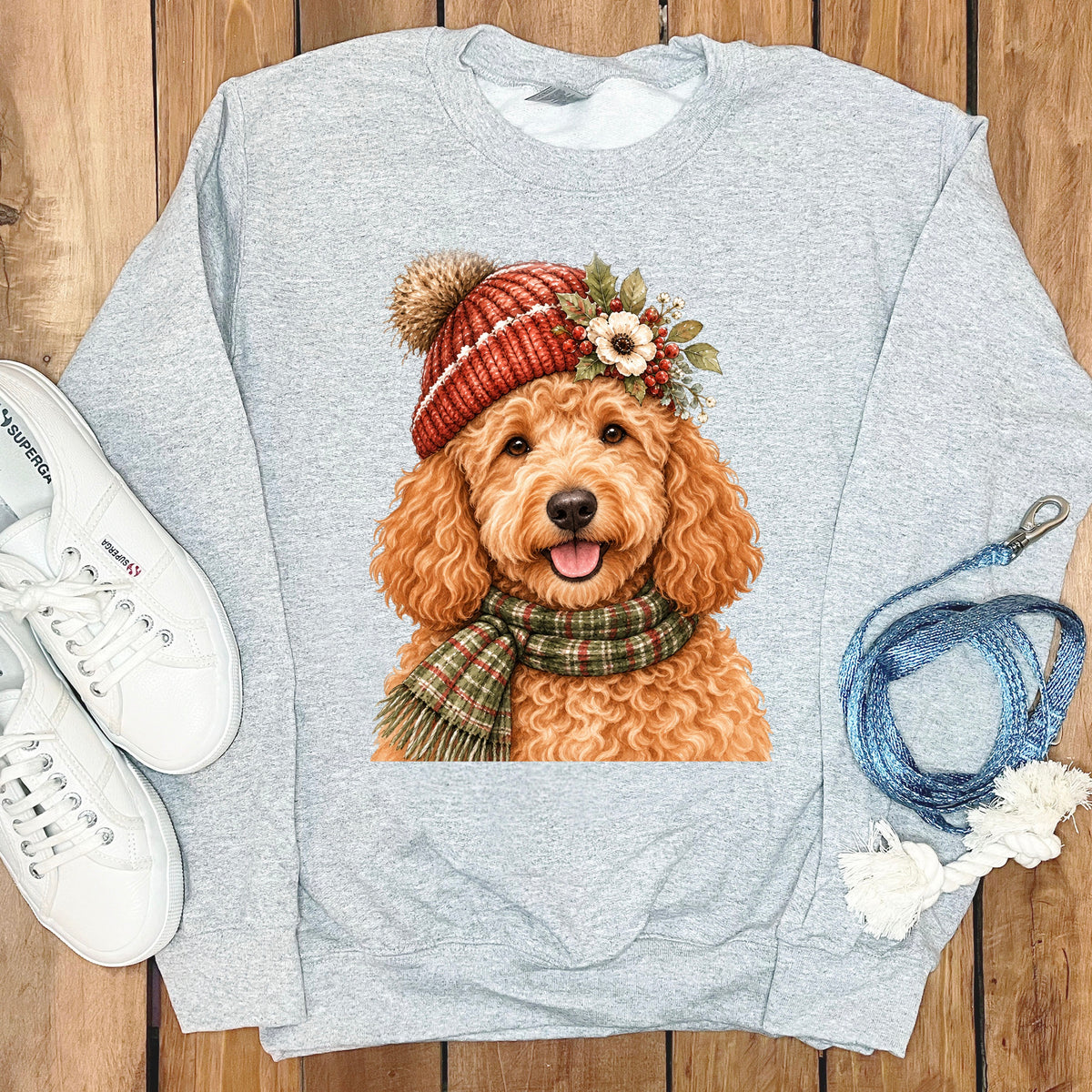 Gray sweatshirt with watercolor illustration of a golden doodle dog wearing a hat and scarf.