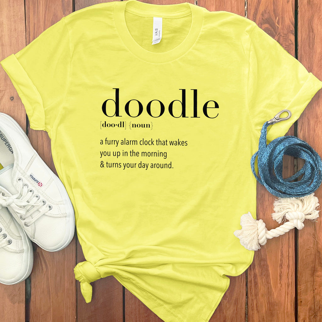 Yellow t-shirt with "doodle" definition: a furry alarm clock.