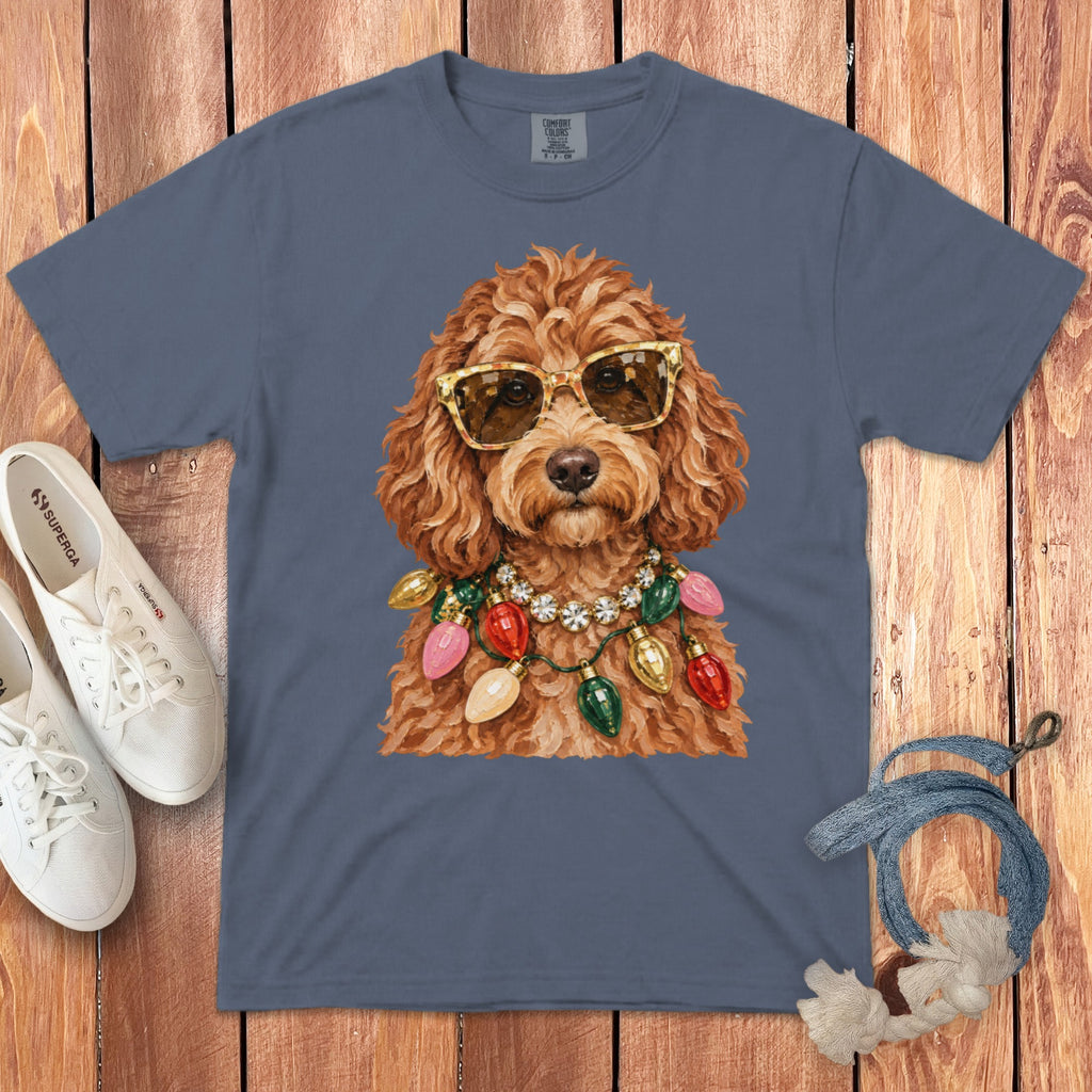 T-shirt with a brown dog wearing sunglasses and a string of Christmas lights.