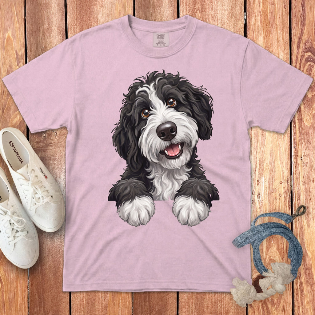 Pink t-shirt with a black and white fluffy dog illustration and "COMFORT COLORS" label.