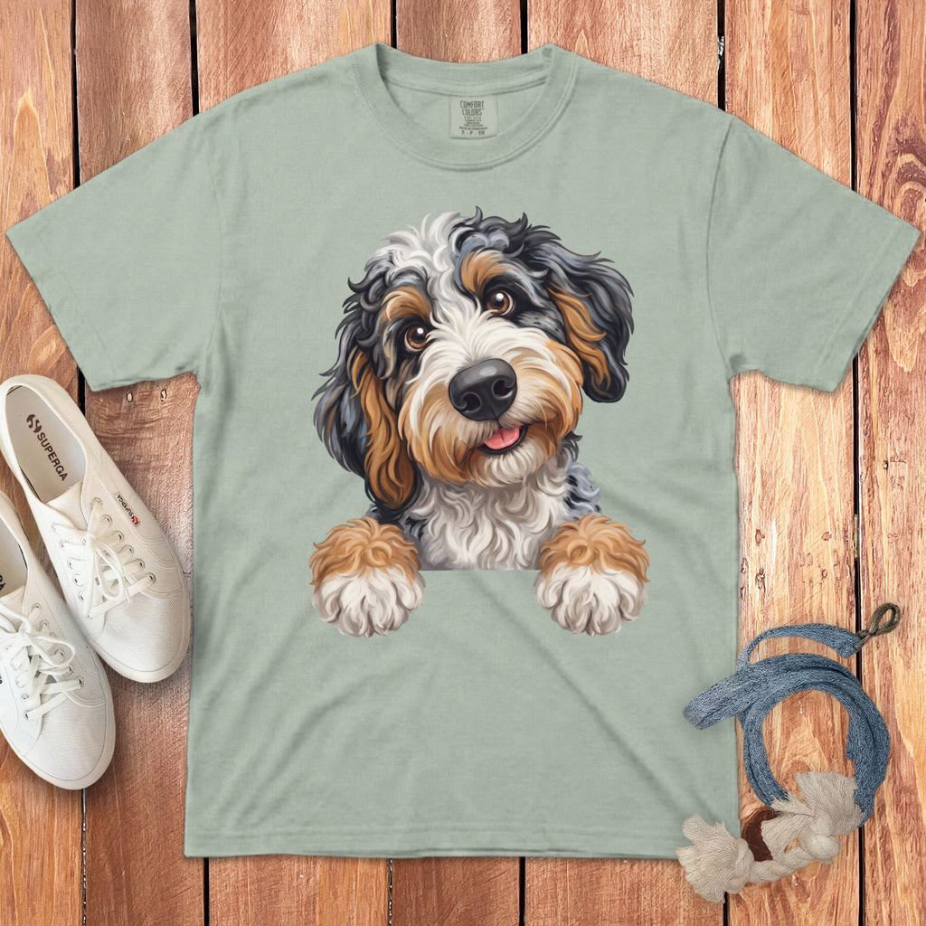 Light green t-shirt with a watercolor illustration of a Bernese Mountain Dog puppy.