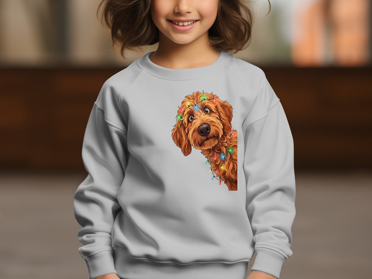 A doodle dog with Christmas lights is printed on a light gray sweatshirt.