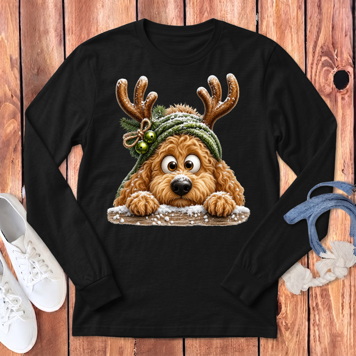 Black long-sleeve shirt with a doodle dog wearing reindeer antlers and a green hat.