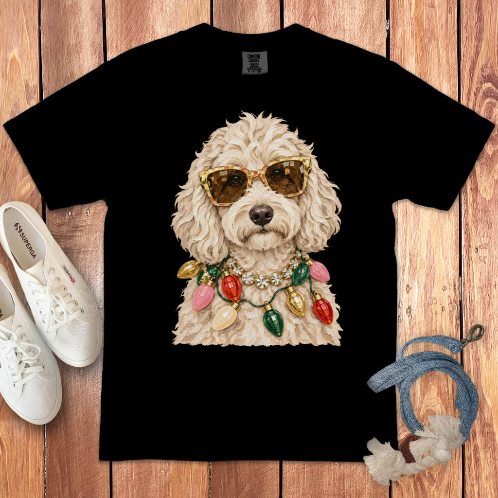 Black t-shirt with a dog wearing sunglasses and Christmas lights as a necklace.