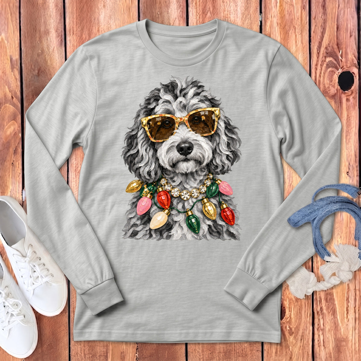 Grey long-sleeve shirt with a dog wearing sunglasses and Christmas lights.
