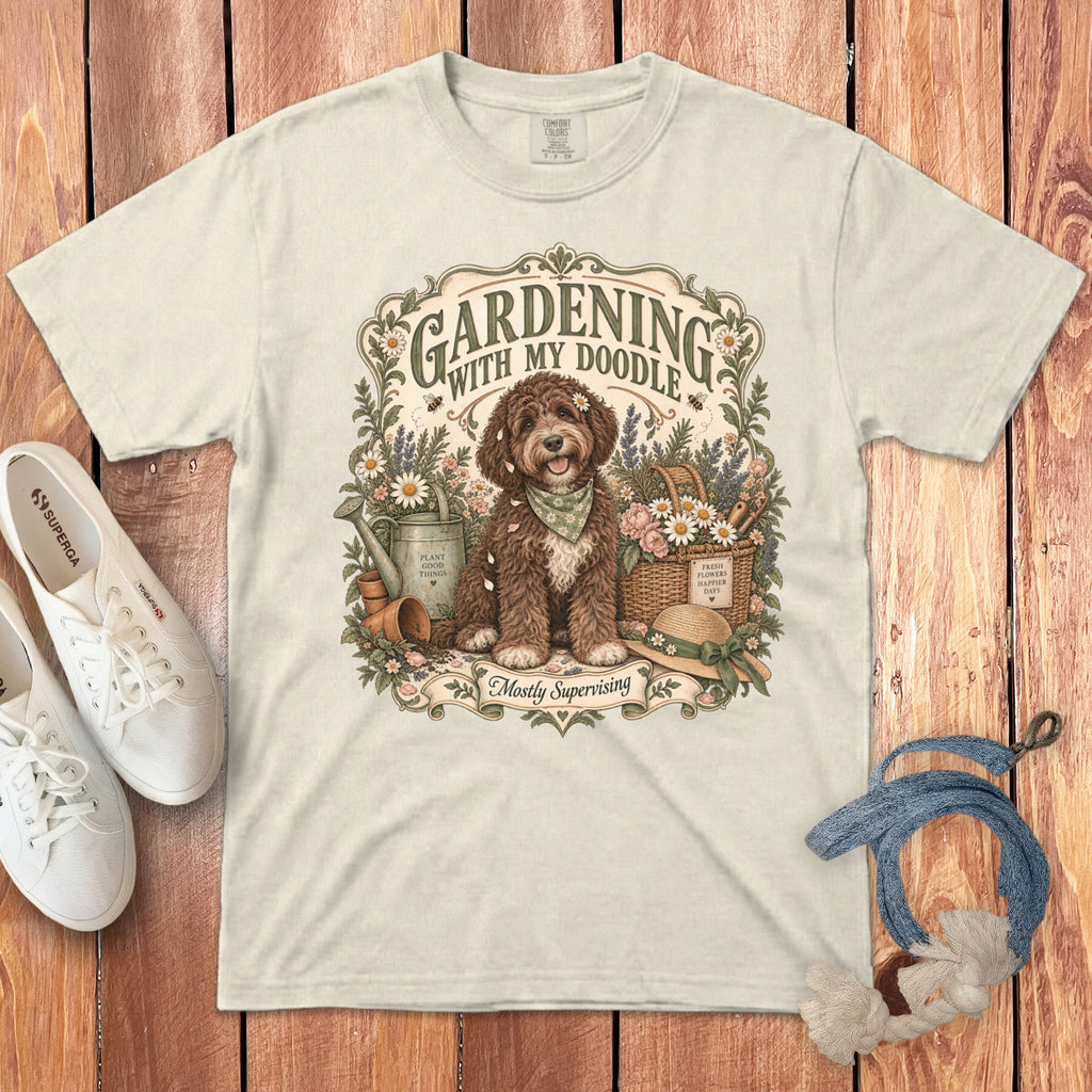 Cream t-shirt with "Gardening With My Doodle" text and a fluffy dog.