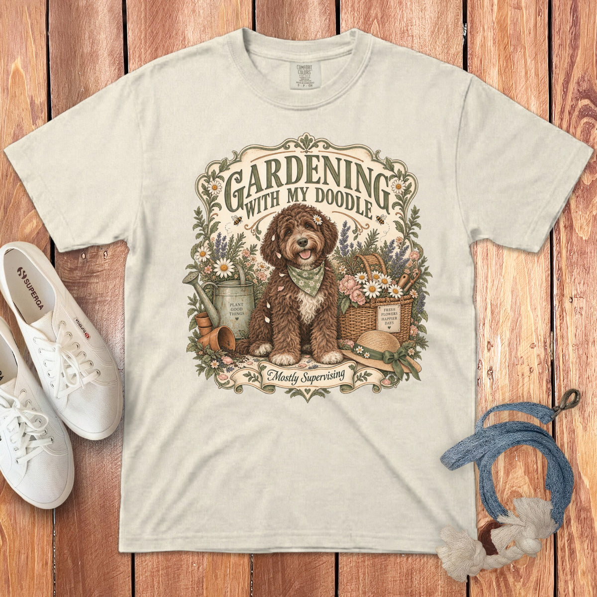 Cream t-shirt with "Gardening With My Doodle" text and a fluffy dog.