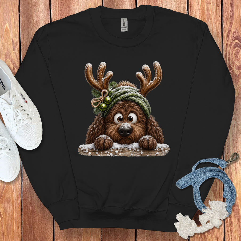 Black sweatshirt with a cute brown dog wearing antlers and a green beanie.