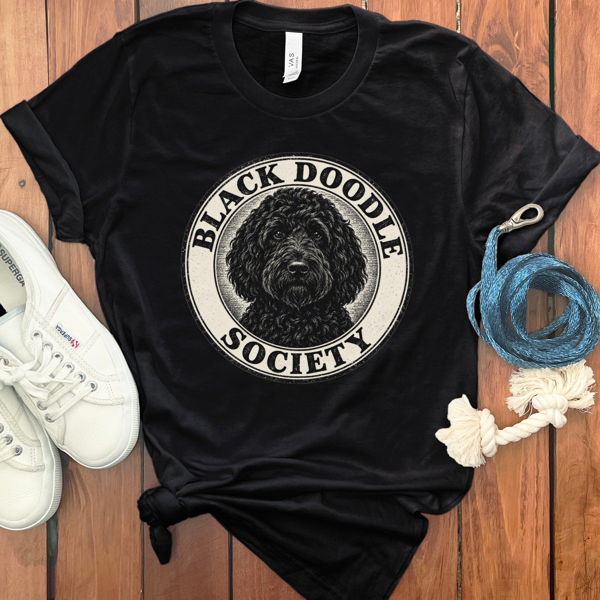 Black t-shirt with "Black Doodle Society" text and doodle dog portrait graphic.