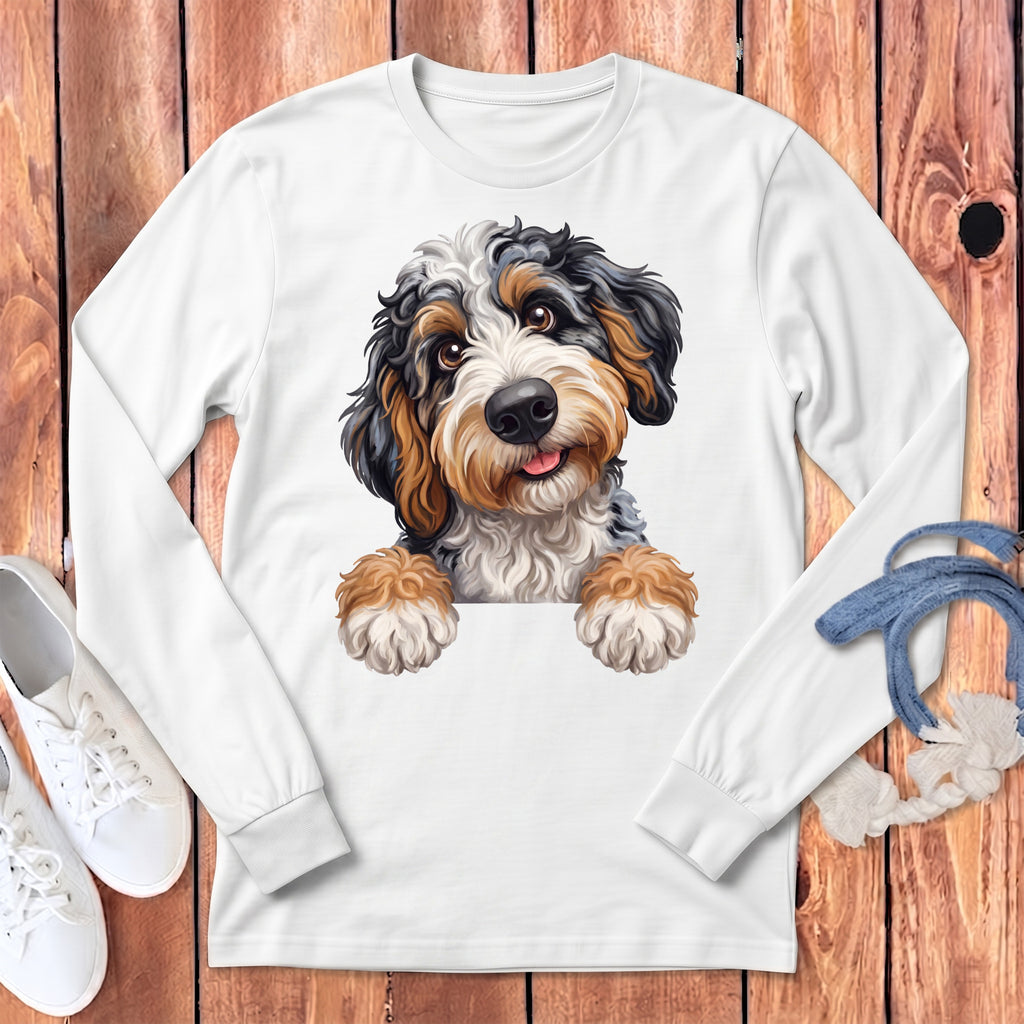 White long sleeve shirt featuring a whimsical Bernedoodle puppy graphic.