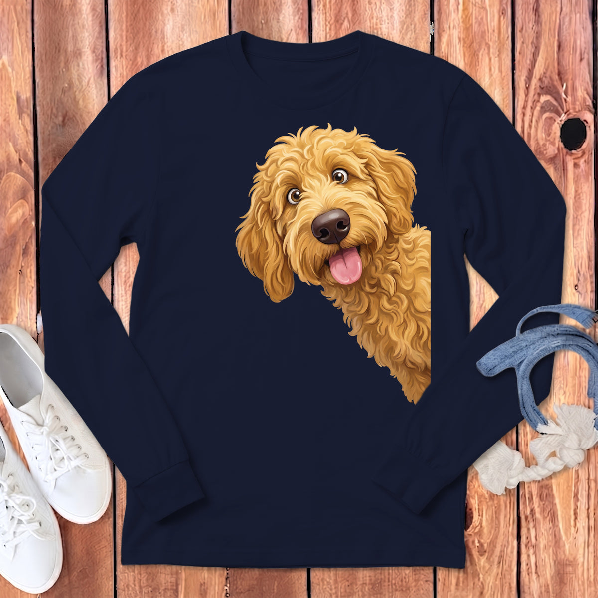 Navy blue long-sleeved shirt with a graphic of a golden doodle dog peering out.