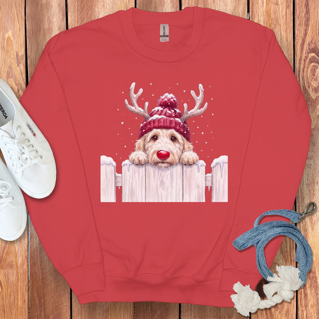 Red crewneck sweatshirt with a dog wearing a reindeer hat and red nose.