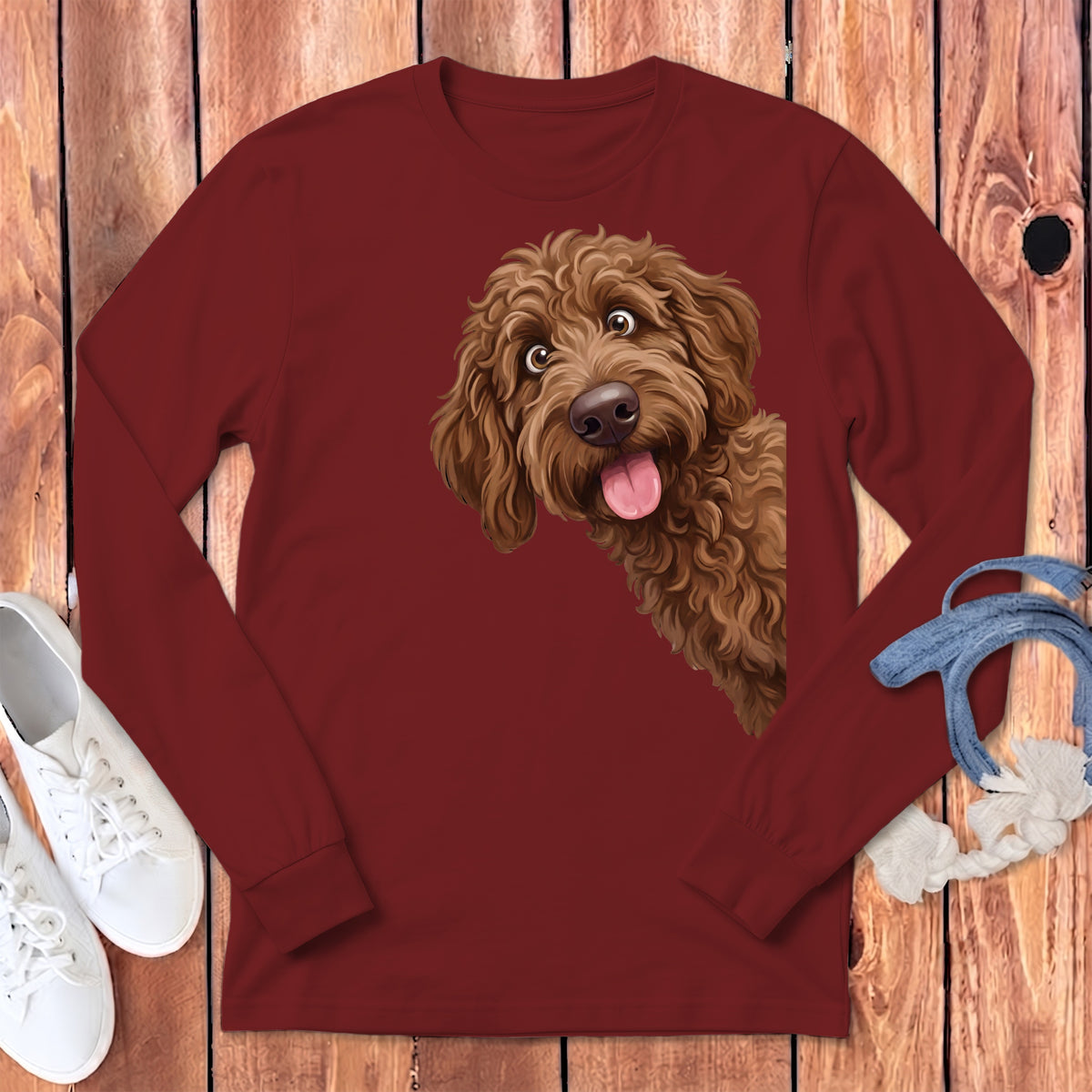Long-sleeve maroon shirt with a cartoon brown dog print peeking from the side.
