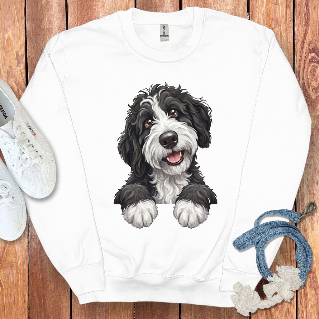 White sweatshirt with a black and white dog illustration on the front.