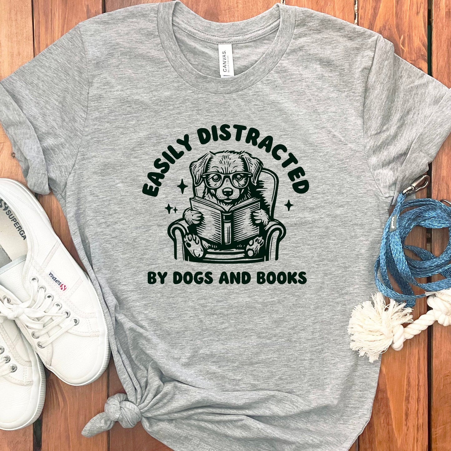 Easily Distracted By Dogs And Books Shirt product