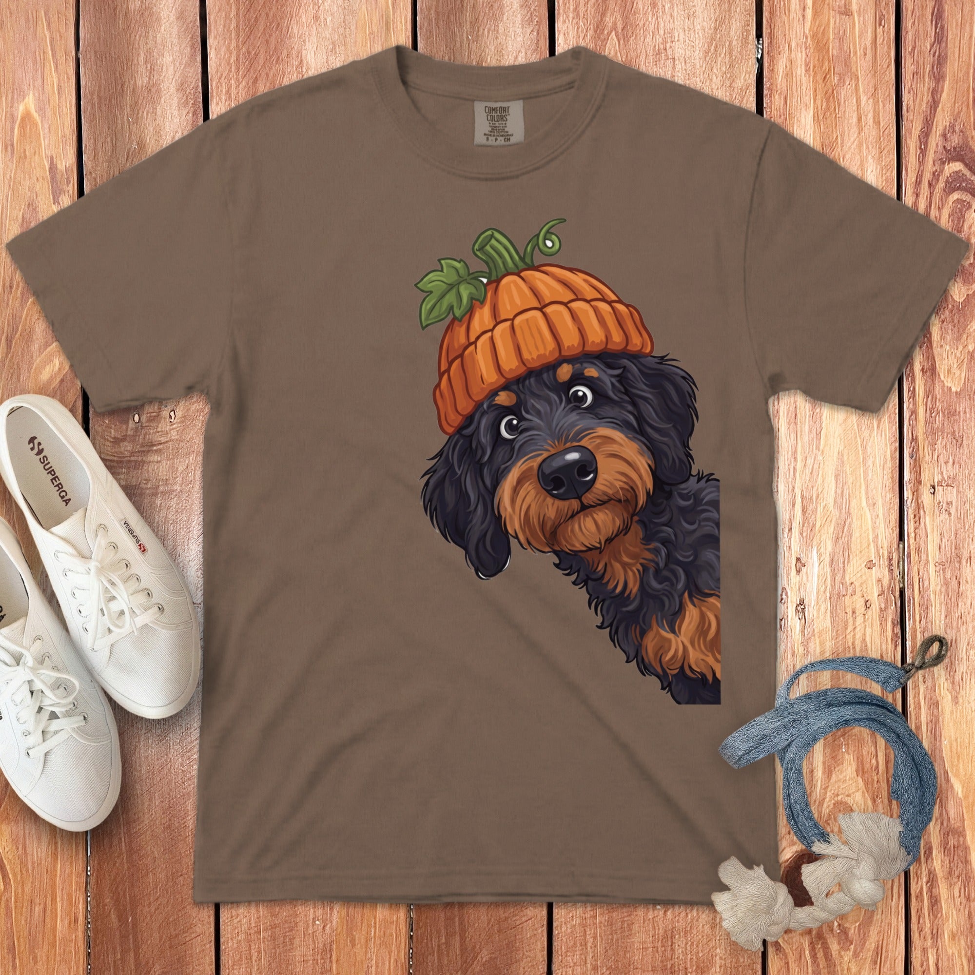 Brown t-shirt with a Rottweiler wearing a pumpkin hat graphic.