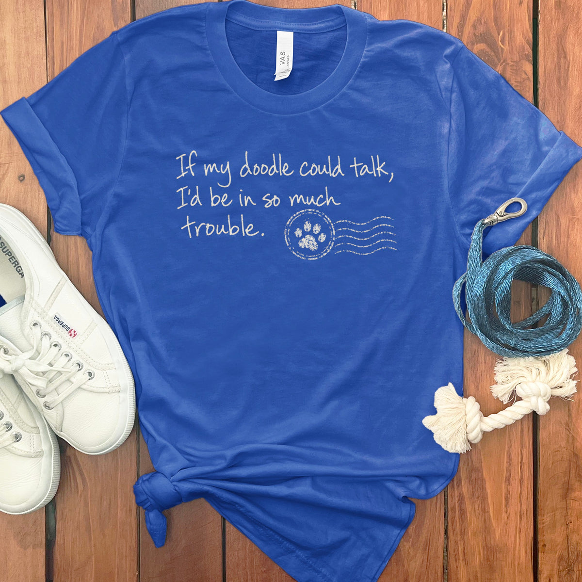 Royal blue t-shirt with "If my doodle could talk, I'd be in so much trouble." text.