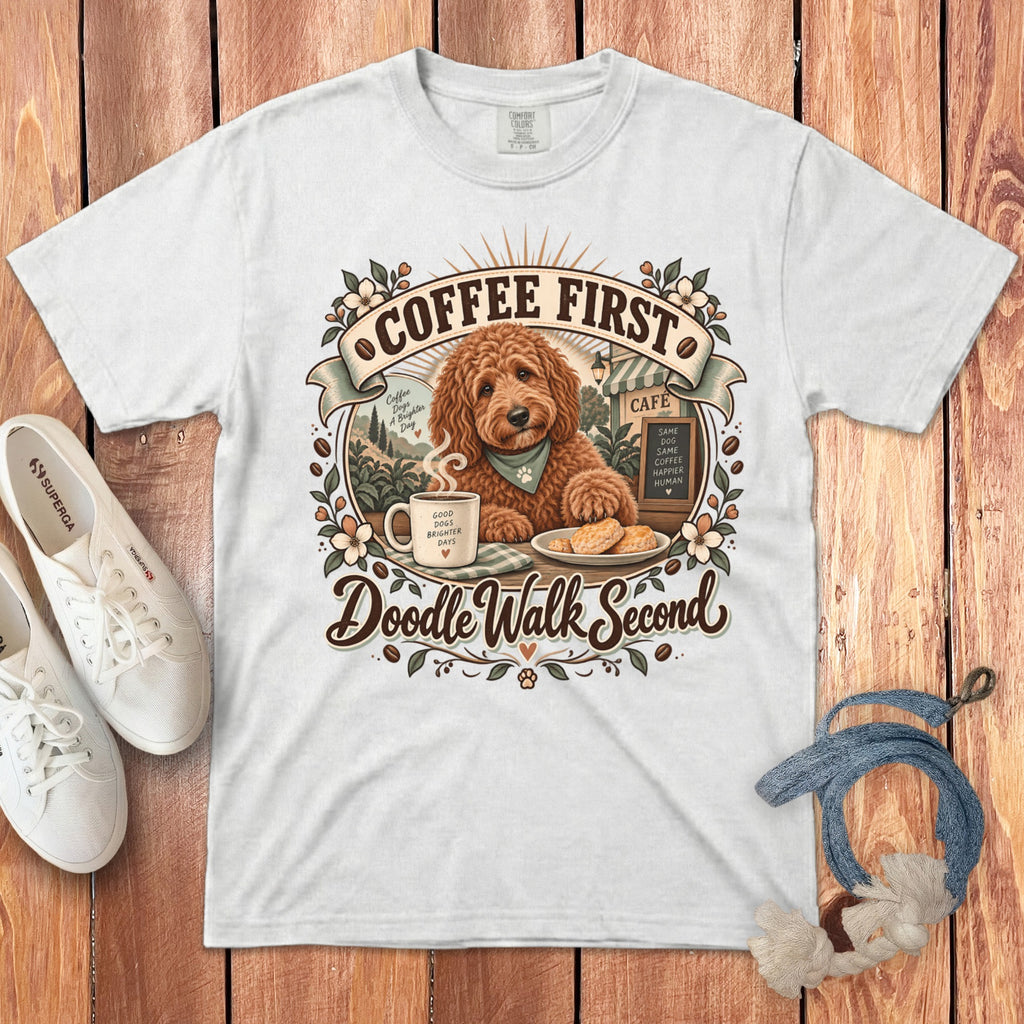 White t-shirt with a doodle dog, coffee, and "Coffee First Doodle Walk Second" text.