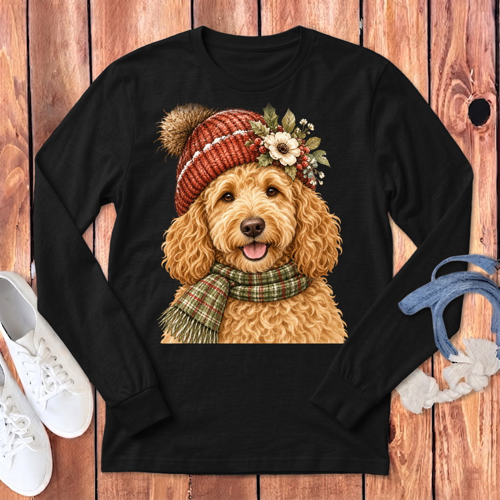 Black long-sleeve shirt with a watercolor-style illustration of a golden doodle dog wearing a hat and scarf.