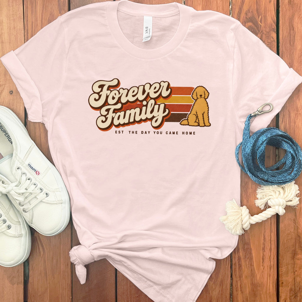 Pink t-shirt with "Forever Family" text and a dog graphic, est. the day you came home.