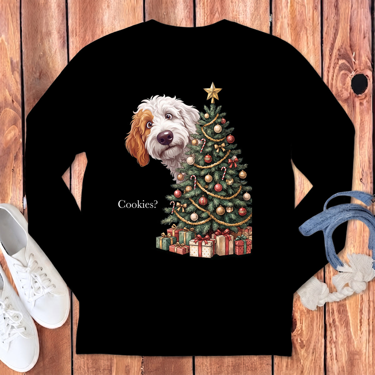 A dog peeks behind a Christmas tree with gifts, asking "Cookies?"