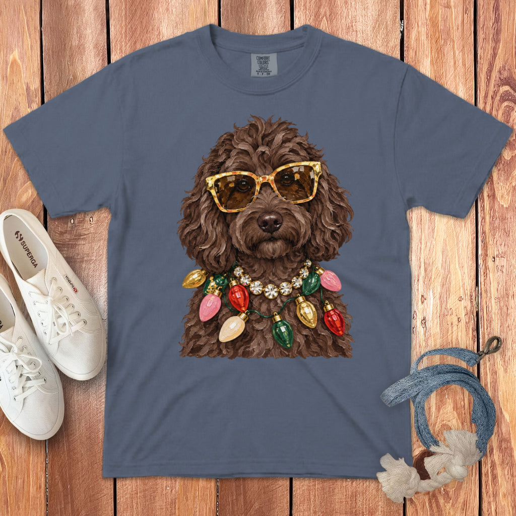 Brown dog wearing sunglasses and a Christmas light necklace.